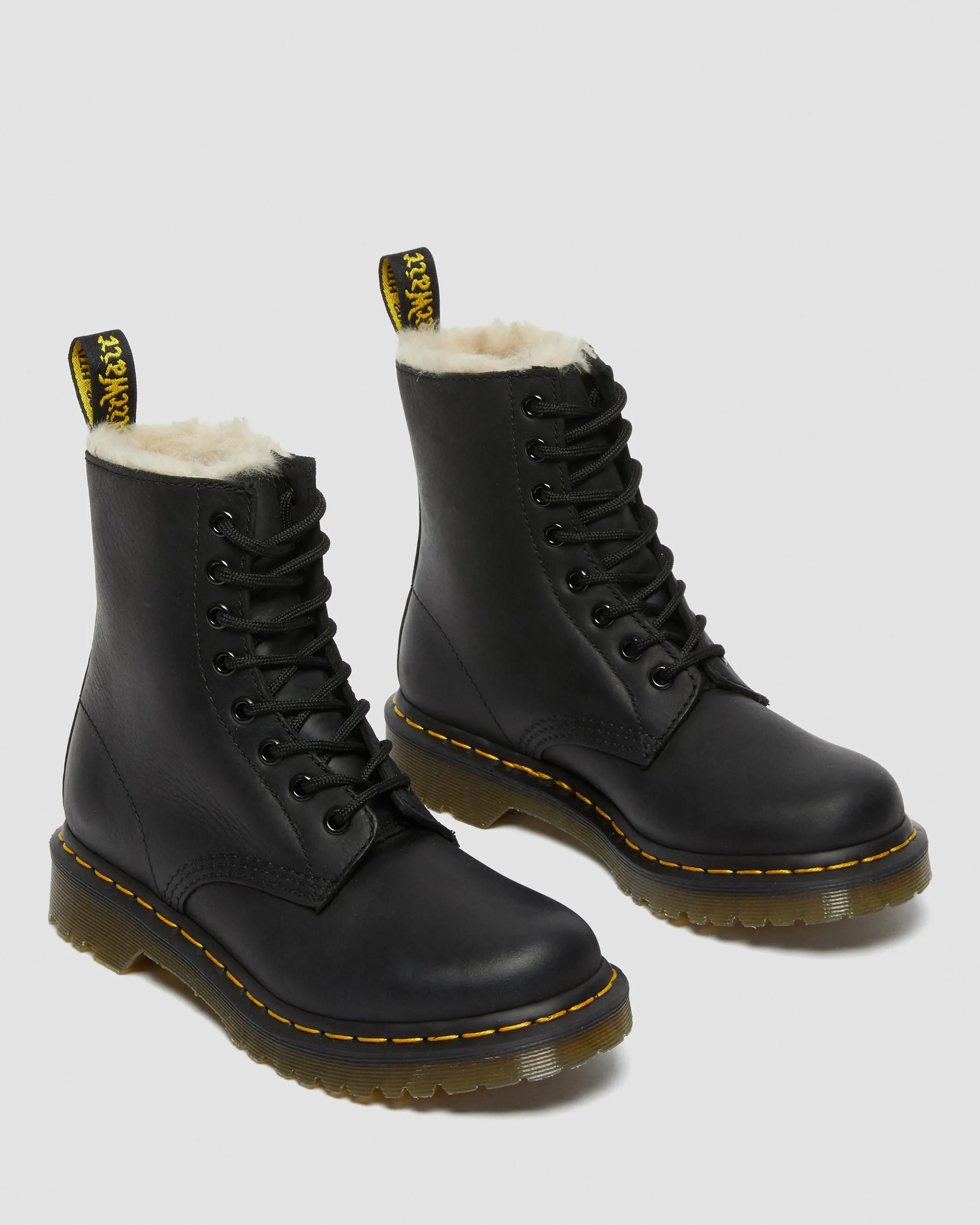 1460 Women's lace-up boots with faux fur lining Dr. Martens