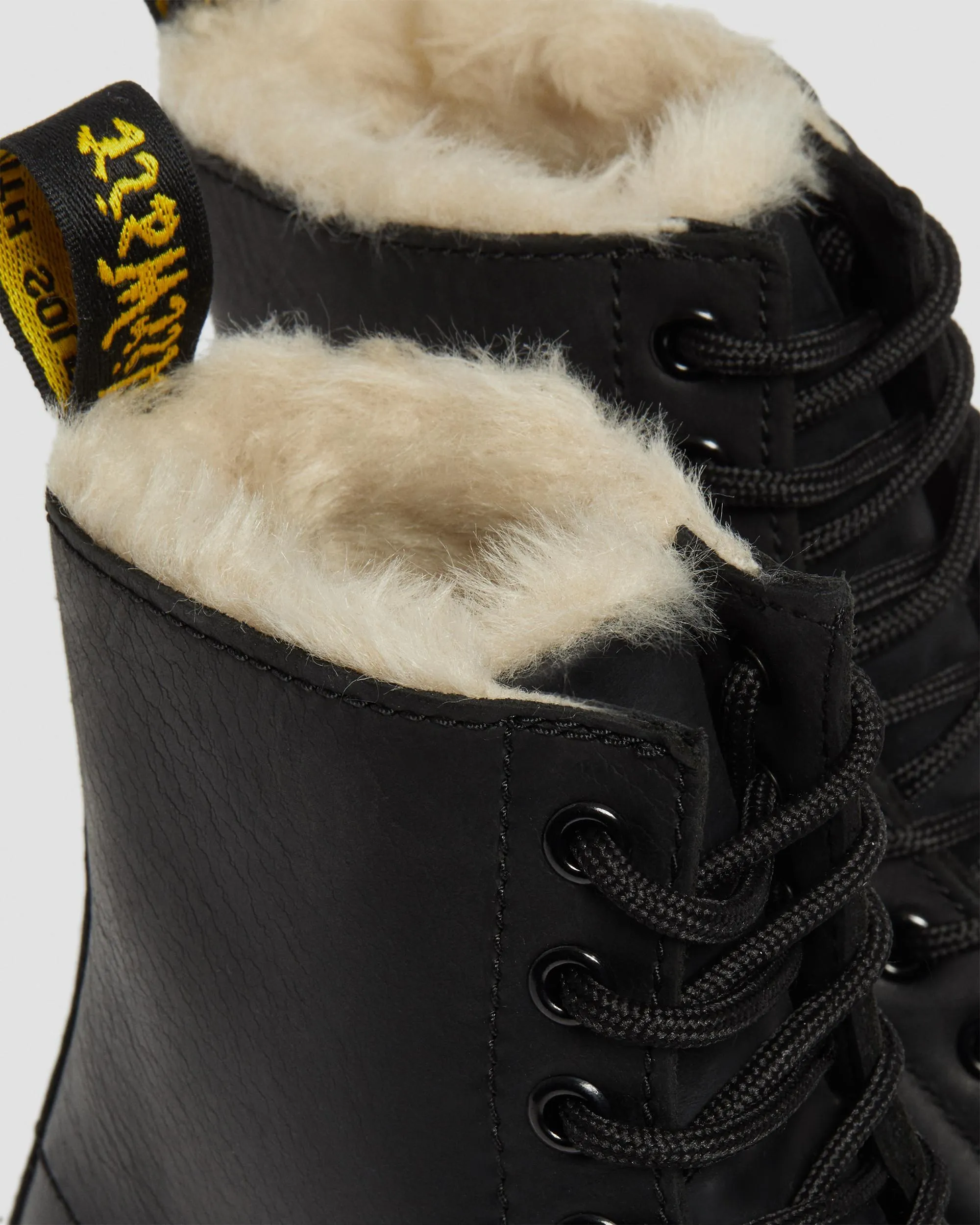 1460 Women's lace-up boots with faux fur lining Dr. Martens